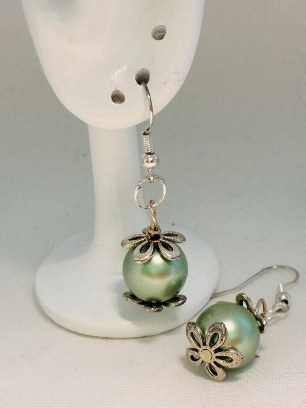 Light Green Pearl Dangle Earrings with Silver Floral Caps